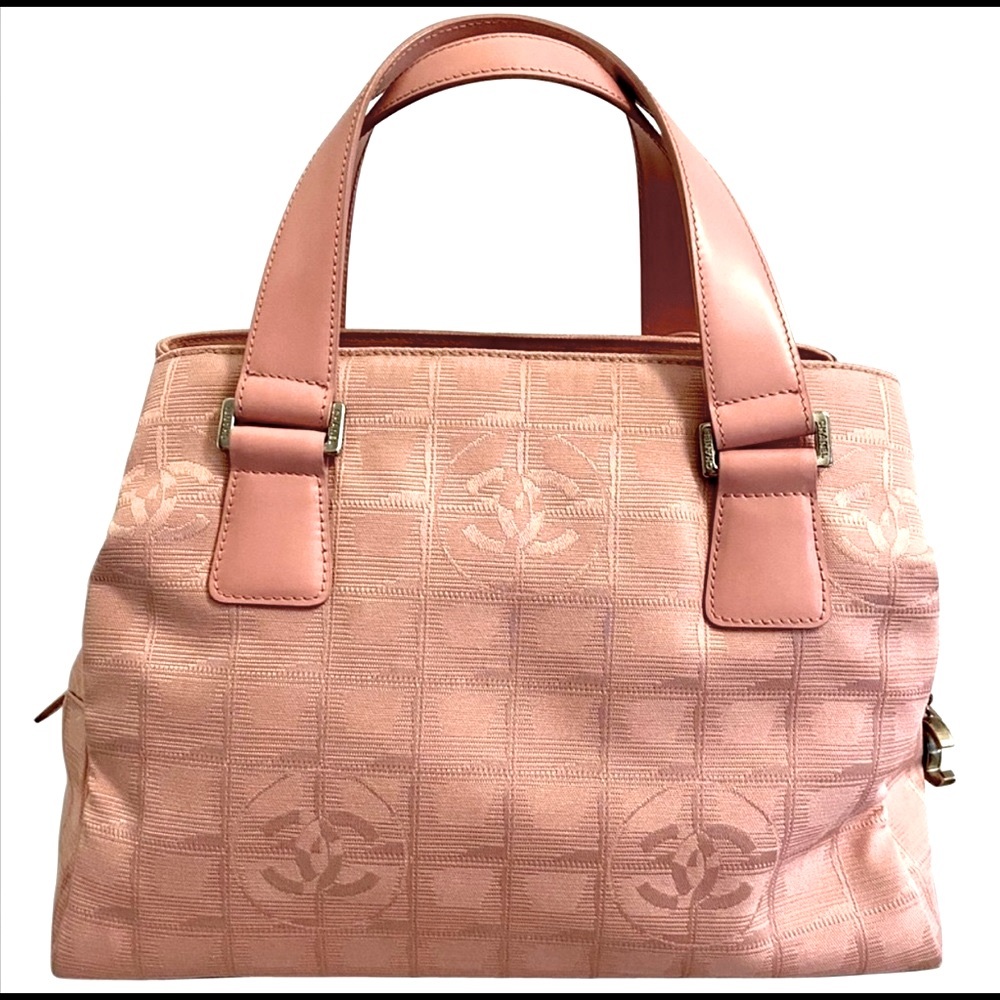 Authentic Chanel pink purse with cc logos